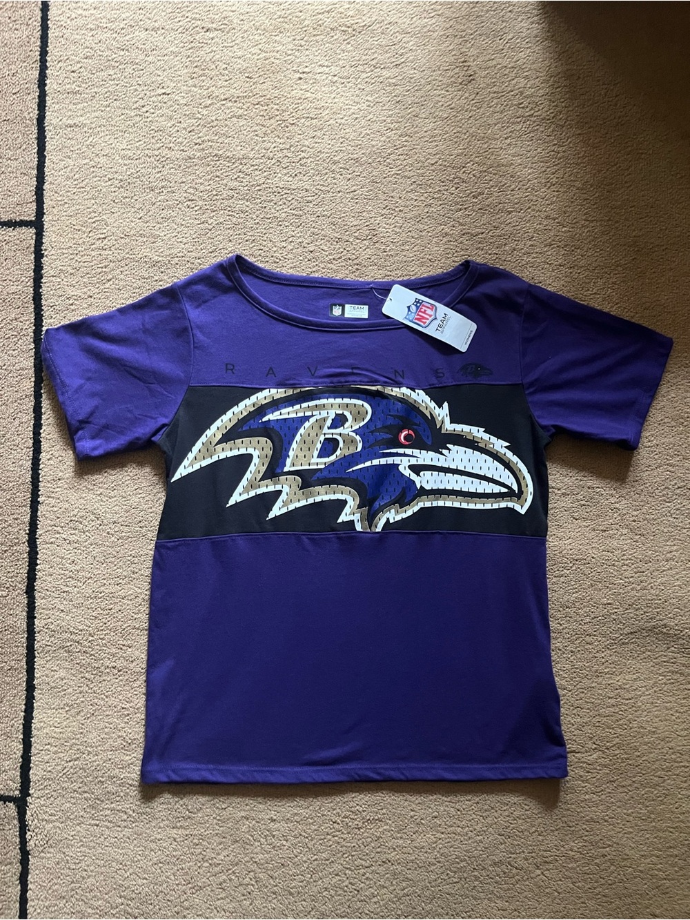 NFL Women's Purple Baltimore Ravens Short Sleeve Tee with Black Logo Panel